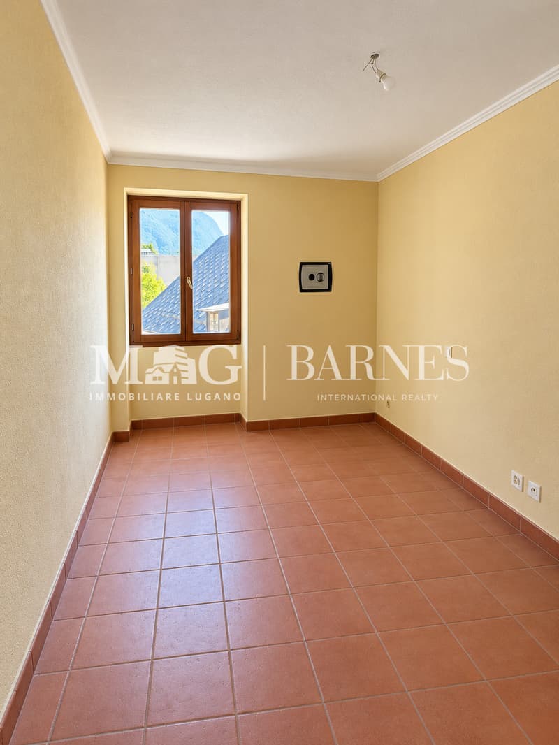 Appartamento 3.5 locali a Ruvigliana con terrazza vista lago di Lugano (11)