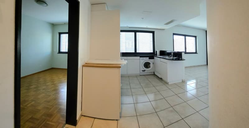 kitchen with white cabinets, white tiled floor, washing machine, sink, windows with blinds