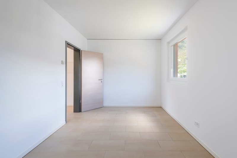 empty room, white walls, tiled floor, open door, window