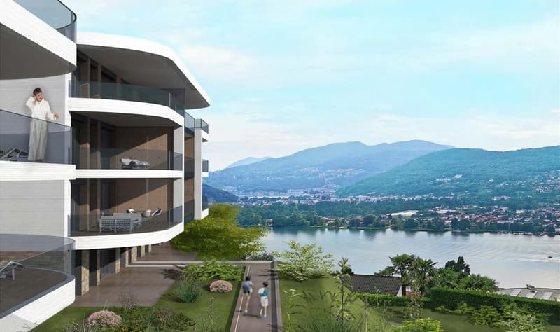 Modern apartment building, balconies, scenic lake view, nearby mountains, greenery landscape
