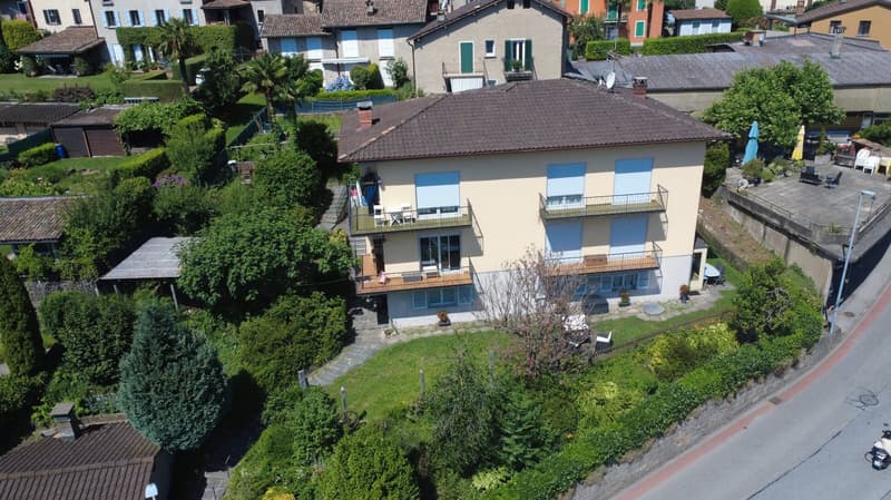 Maison multifamiliale avec grand jardin à Comano (7)