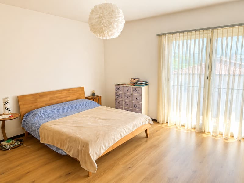 Maison multifamiliale avec grand jardin à Comano (5)