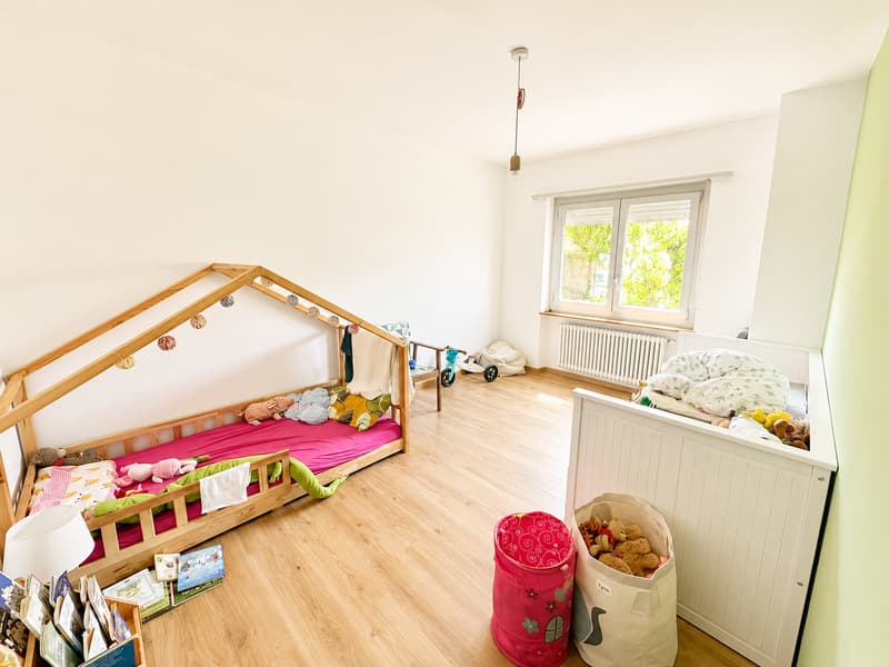 Maison multifamiliale avec grand jardin à Comano (6)