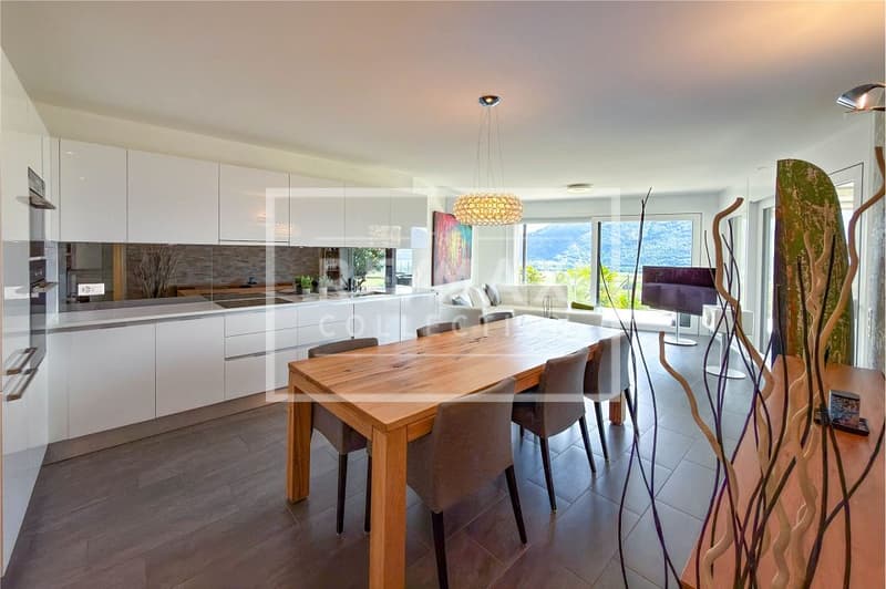 Appartamento 3.5 locali con giardino e vista lago (4)