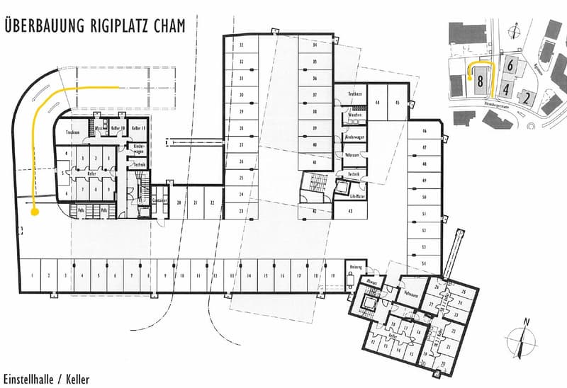 The image shows a floor plan of a building called 'Uberbauung Rigiplatz Cham'. It includes a garage, a technical room, a cellar, and several rooms labeled as 'Keller' (cellar) and 'Wohnung' (apartment). The plan also includes a staircase and an elevator.