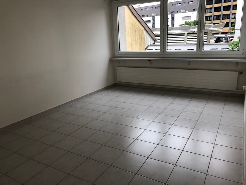 empty room, large window, tiled floor, radiator