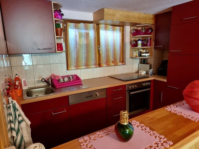 kitchen, sink, oven, dishwasher, red cabinets, countertop, small windows, open shelves