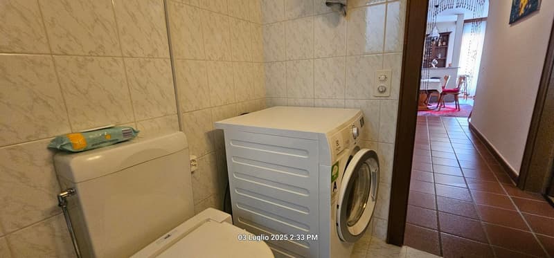 Accogliente appartamento di 3.5 locali a Cademario con piscina e vista panoramica (12)