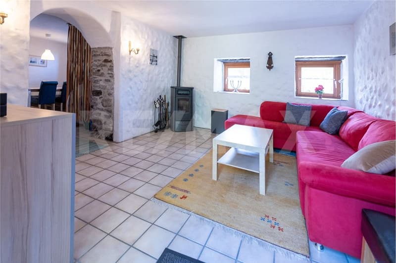 Affascinante casa unifamiliare con giardino, sottotetto e posto auto (4)