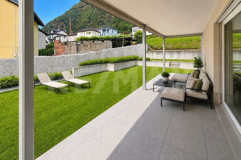 Appartamento 3.5 con giardino e 2 posti auto (1)