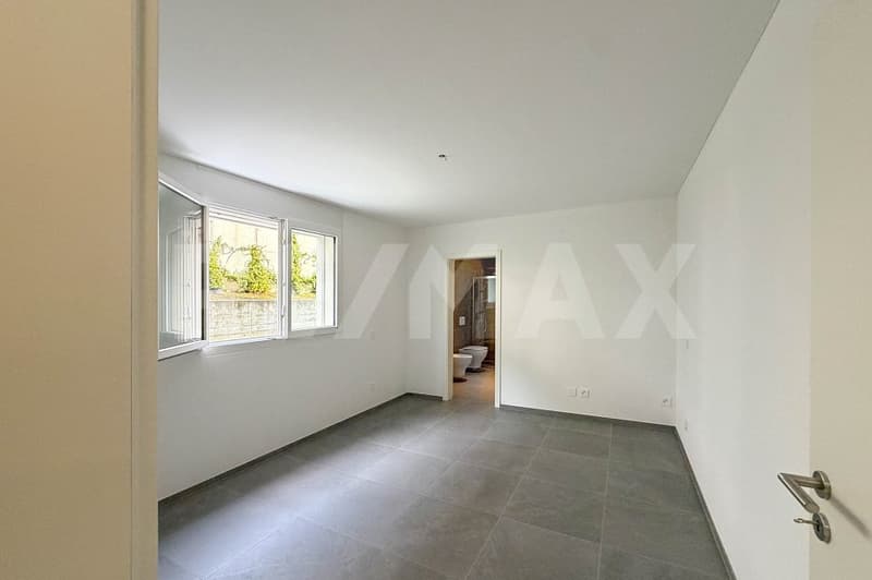 Appartamento 3.5 con giardino e 2 posti auto (10)