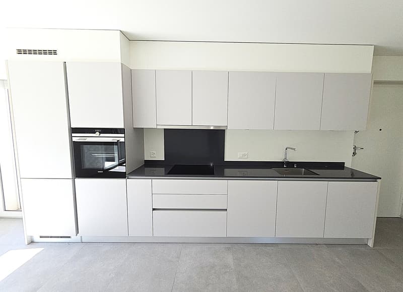 Moderno appartamento di 4.5 locali con giardino a Claro – Nuova costruzione con vista (3)