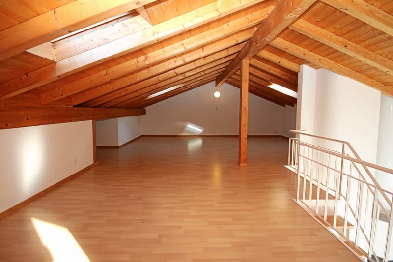 empty room, wooden ceiling, white walls, wooden floor, staircase on right