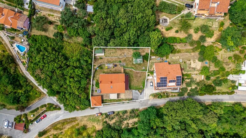 House with solar panels, swimming pool, driveway, multiple buildings, trees