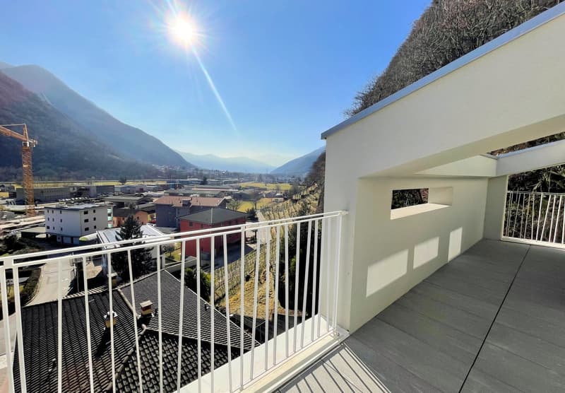 Terrace with balcony, gray floor, white railing, mountain view