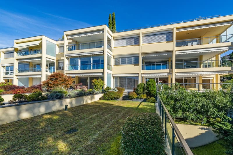 Elegante appartamento con giardino e vista lago, a due passi dal TASIS (1)