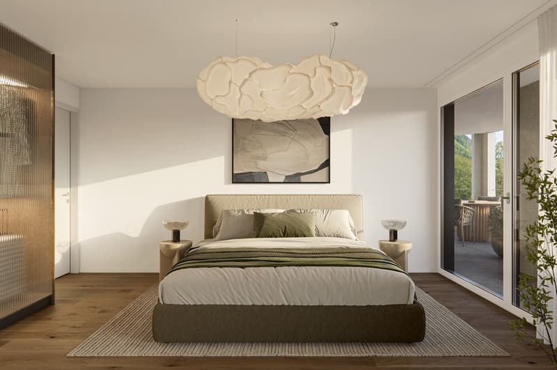 large bed, beige headboard, white bedding, wooden floor, modern chandelier, sliding doors to balcony, wooden side tables, decorative pillows, picture frame, glass cabinet, greenery