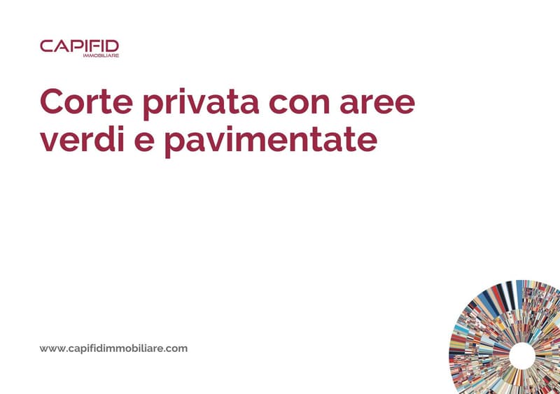 Description of a private courtyard with greenery and pavement