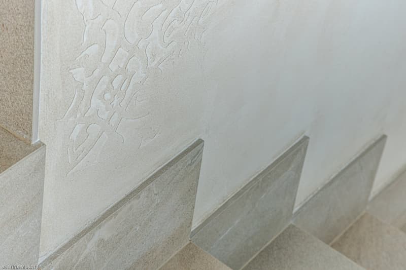 Marble stairs with tiled corners