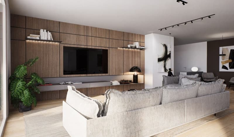 Large living room with wooden paneled walls, built-in TV entertainment unit, plush grey sectional sofa, potted plant, and track lighting.