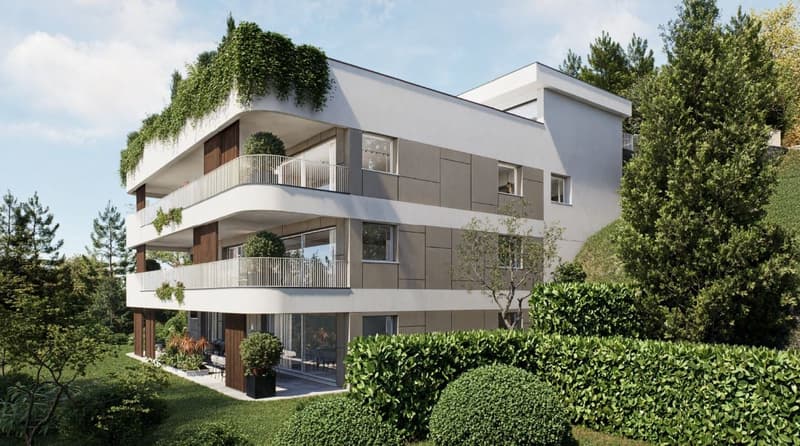 Modern apartment building, white exterior, green rooftop, multiple balconies, large windows, surrounded by greenery