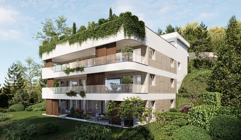 3 story apartment building, white and brown exterior, multiple balconies, green rooftop, surrounded by trees and plants