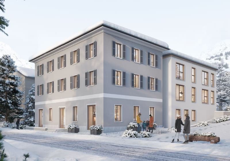 Large apartment building, raised ground floor, gray walls, white windows, entrance door, snow covered ground, snow-covered trees