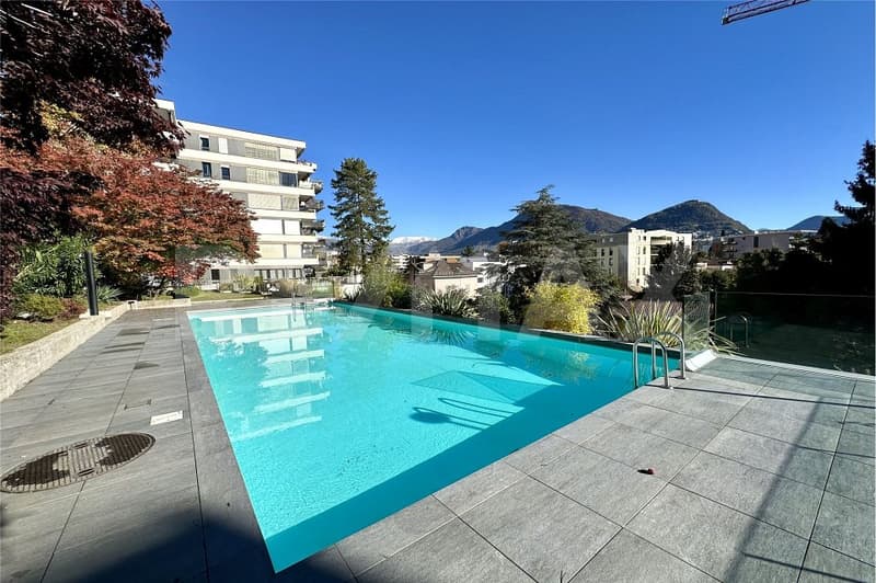 Appartamento 4.5 locali con vista mozzafiato su Lugano e il Monte Brè (1)