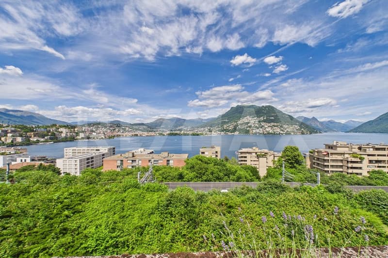 Vista mozzafiato sul golfo di Lugano  elegante appartamento con terrazza (2)