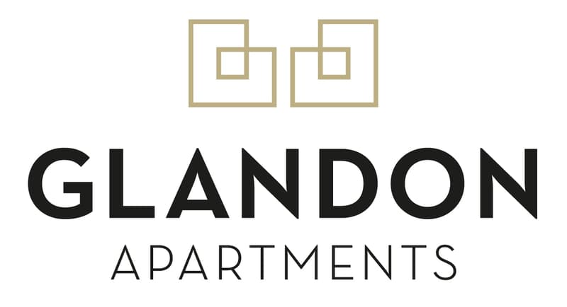 The image shows the logo for Glandon Apartments, which consists of a geometric design with two square frames and the text 'GLANDON APARTMENTS' written below.