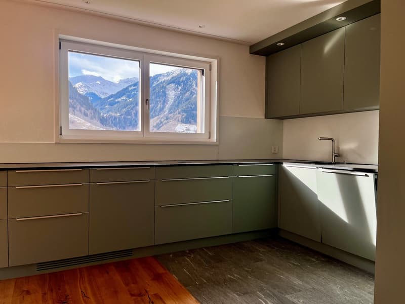 modern kitchen, window with mountain view, stainless steel appliances, granite countertops