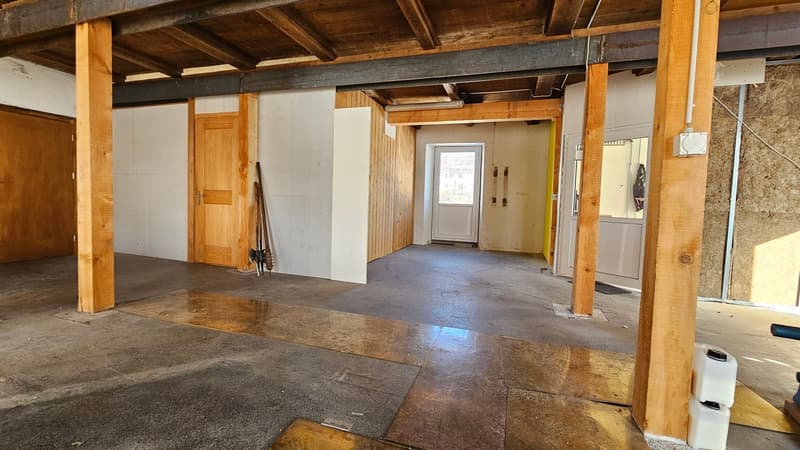 empty room, wooden beams, concrete floor, walls, doorways, windows