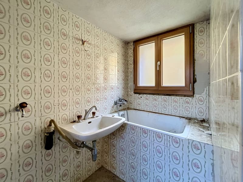 Appartement avec potentiel de rénovation et vue sur les montagnes (8)
