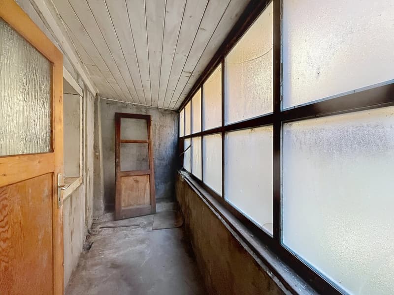 Appartement avec potentiel de rénovation et vue sur les montagnes (13)