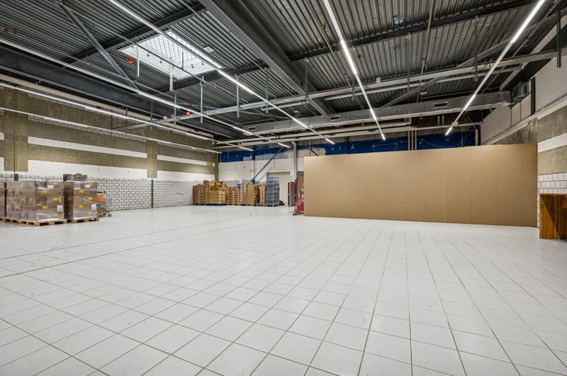 industrial building, white tiles, warehouse area, large room, metal roof