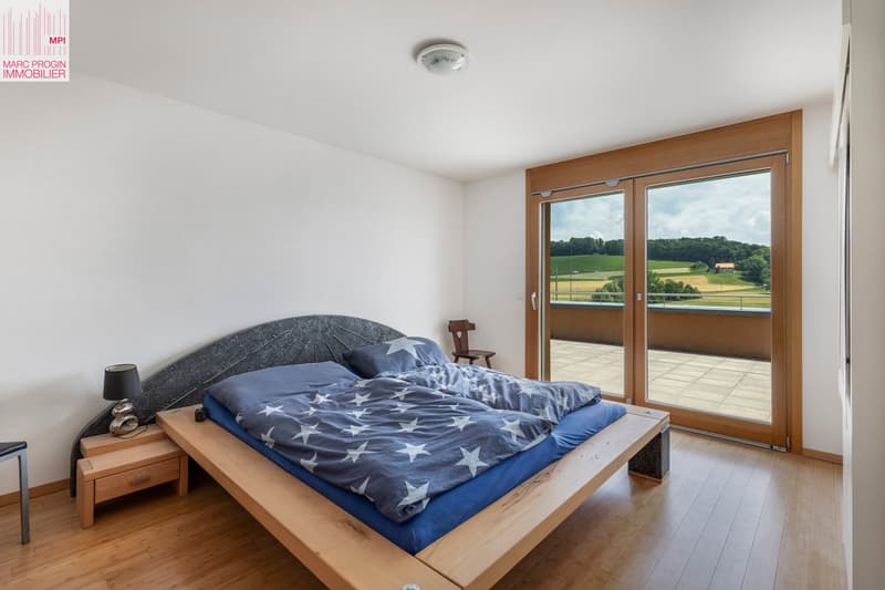 Chambre parents avec accès terrasse au sud est
