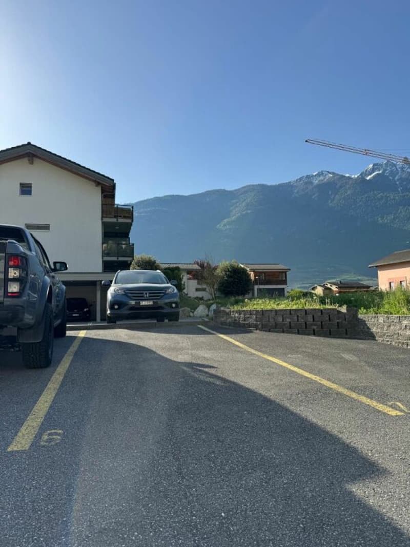 Double outdoor parking spaces in length or space for a camper (2)