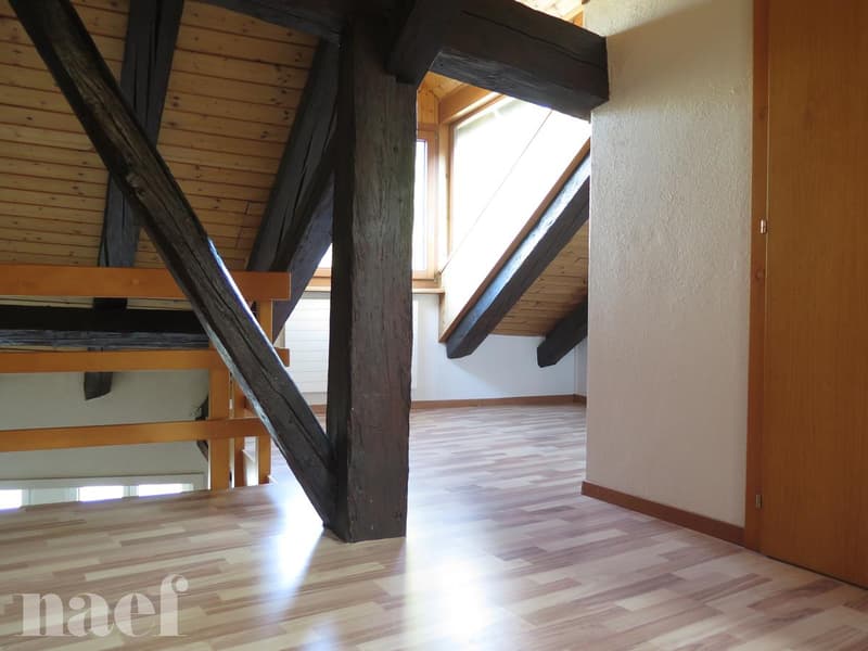 Au coeur du village de Corcelles, au dernier étage d'une maison villageoise (8)