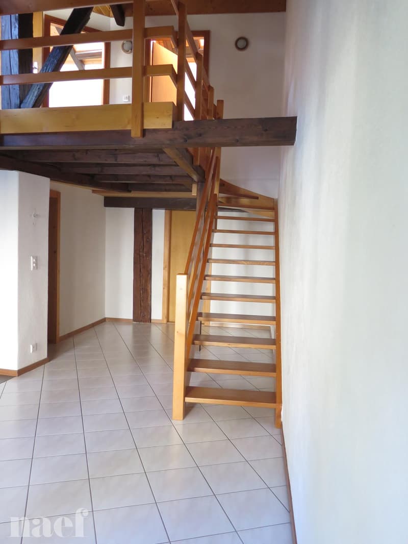 Au coeur du village de Corcelles, au dernier étage d'une maison villageoise (3)
