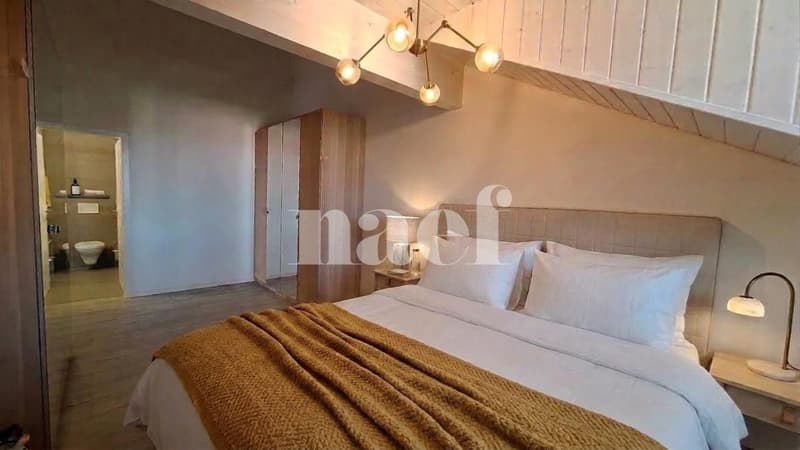 Bello appartamento di 4 locali nel sottotetto con ampio balcone e vista lago (5)