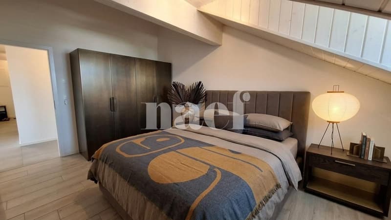 Bello appartamento di 4 locali nel sottotetto con ampio balcone e vista lago (4)
