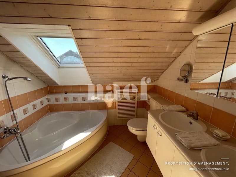 Au centre du village- Bel appartement de 5.5 pièces dans les combles avec cheminée et grand balcon (8)