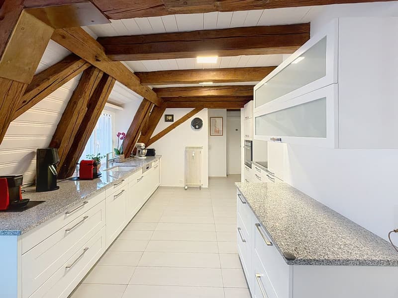 Magnificent apartment in the center of Peseux. Calm, serene, 2 steps from transportation, schools, and shops. (5)
