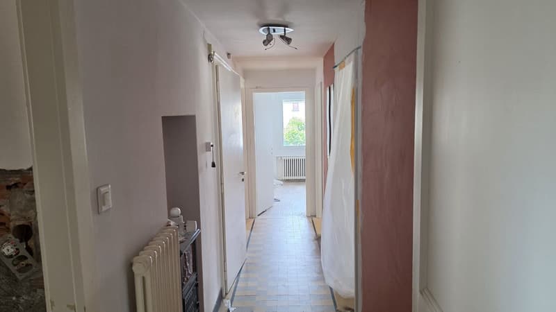 Building with 2 apartments, a commercial space - 2 bedrooms - 2 parking spaces and a garage/terrace in the village center (13)