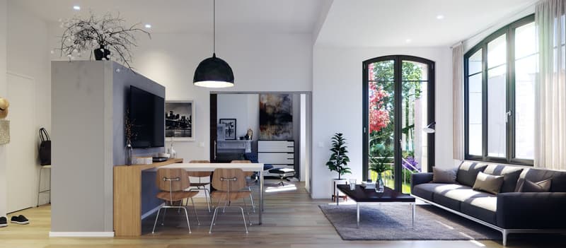 Spacious open-plan living area with dining table, modern furniture, large windows overlooking a garden, and a black pendant light fixture