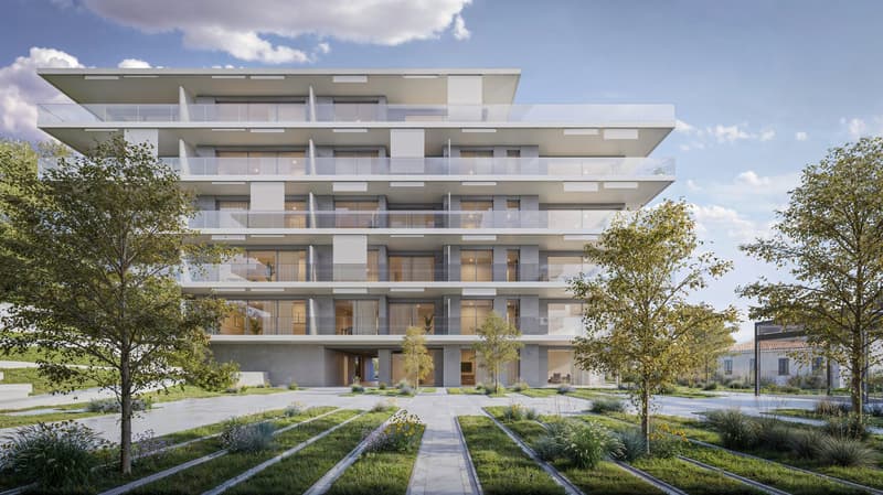A modern, multi-story apartment building with a clean, minimalist design. The building features large windows and balconies on each floor, providing ample natural light and outdoor space for the residents. The building is surrounded by a well-landscaped g