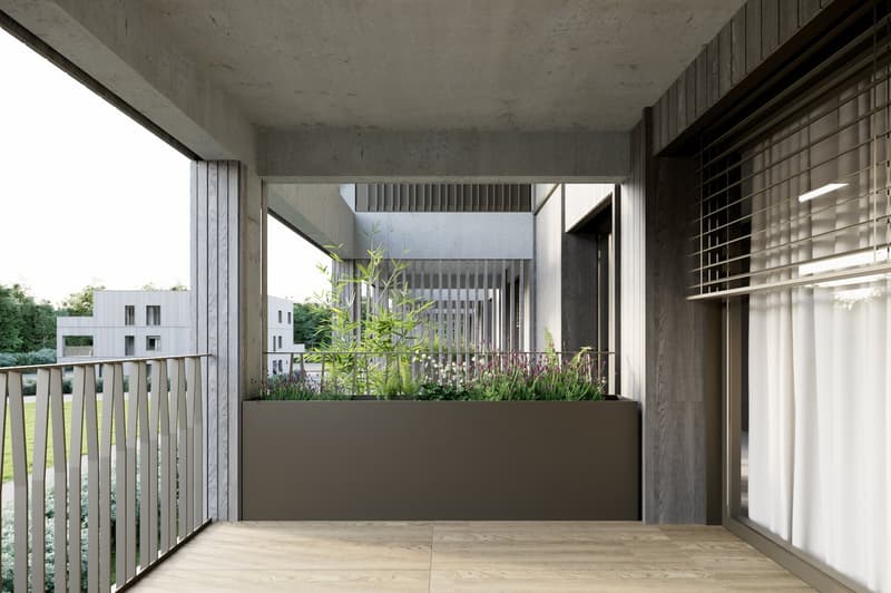 Concrete balcony with wooden railings, planter box with plants, view of surrounding buildings
