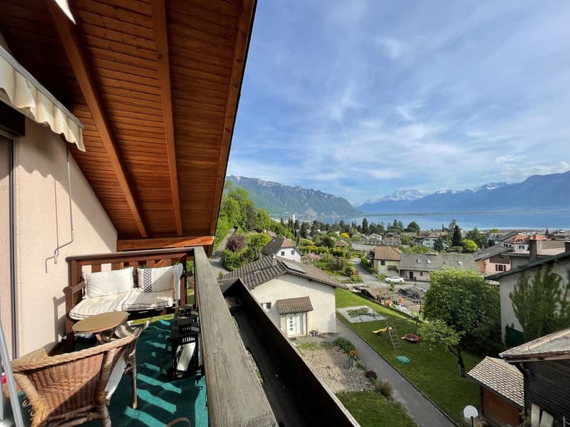 Charming 3.5-room apartment for rent with breathtaking panoramic views of the lake and the Alps (2)