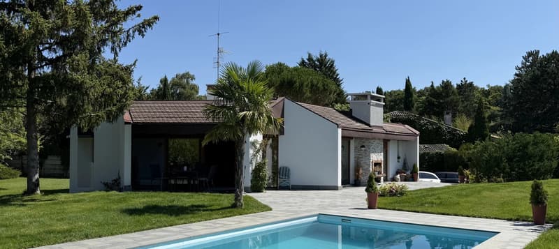 VILLA DE LUXE À VESSY AVEC PISCINE ET POTENTIEL D'AGRANDISSEMENT (1)