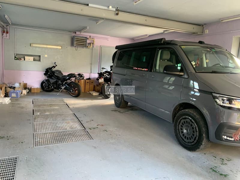 Rental building with 3 apartments, office, garage/hangar and garden (7)